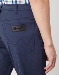 WRANGLER TEXAS SLIM MĘSKIE SPODNIE MATERIAŁOWE NAVY W12SWA114