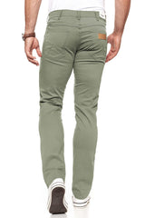 WRANGLER SPODNIE MĘSKIE GREENSBORO DUSTY GREEN W15QSM22A